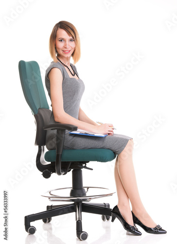 young business woman sitting with her clipboard isolated