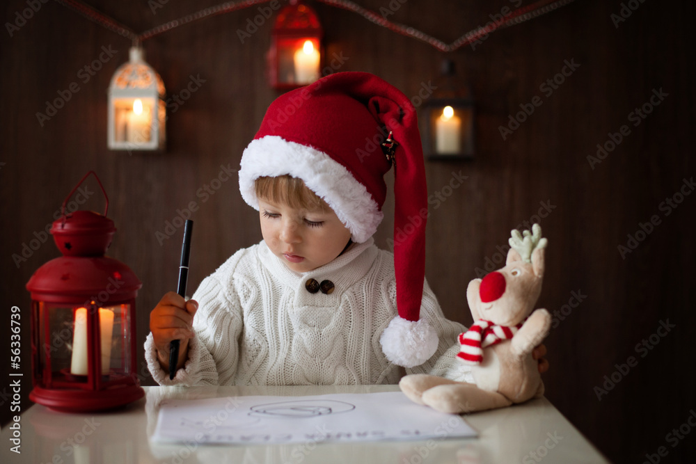 Boy, writing lettler to Santa Boy, writing lettler to Santa
