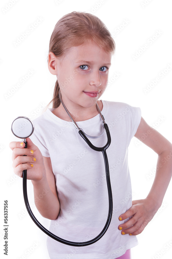 Happy girl playing a doctor with a stethoscope Happy girl playing a doctor with a stethoscope