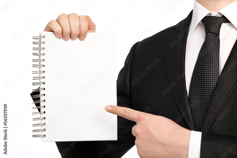 Isolated businessman holding a notebook or piece of paper Isolated businessman holding a notebook or piece of paper