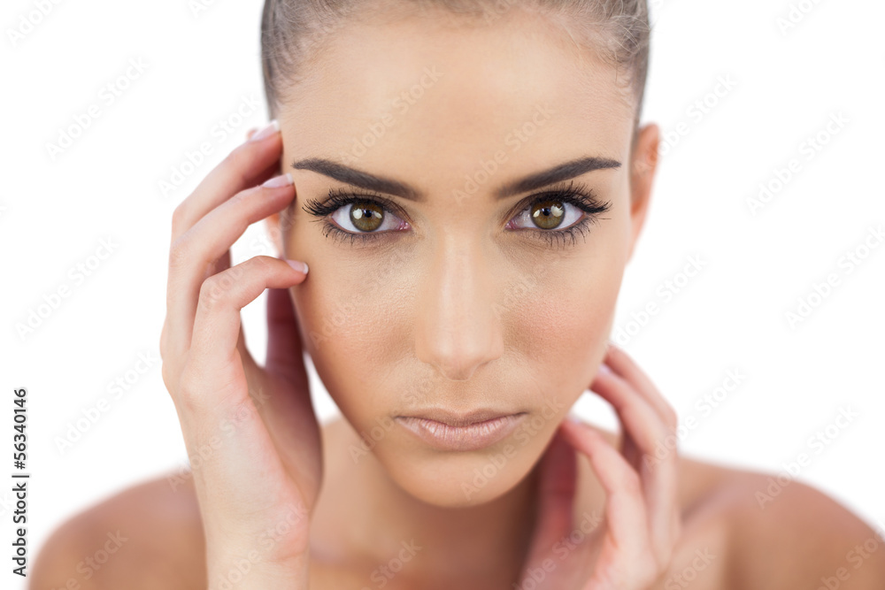 Close up of a serious woman looking at camera Close up of a serious woman looking at camera