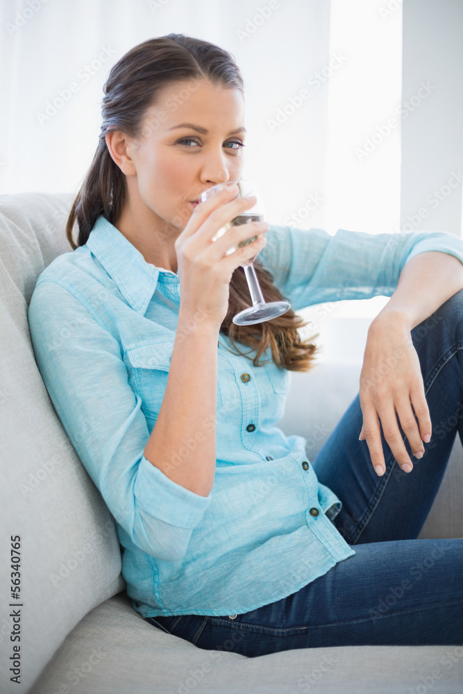 Peaceful woman drinking white wine Peaceful woman drinking white wine