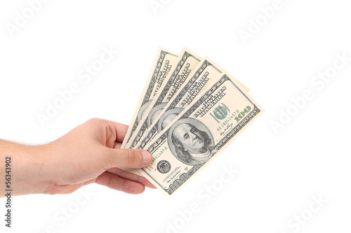 Hand holds one hundred bancknotes