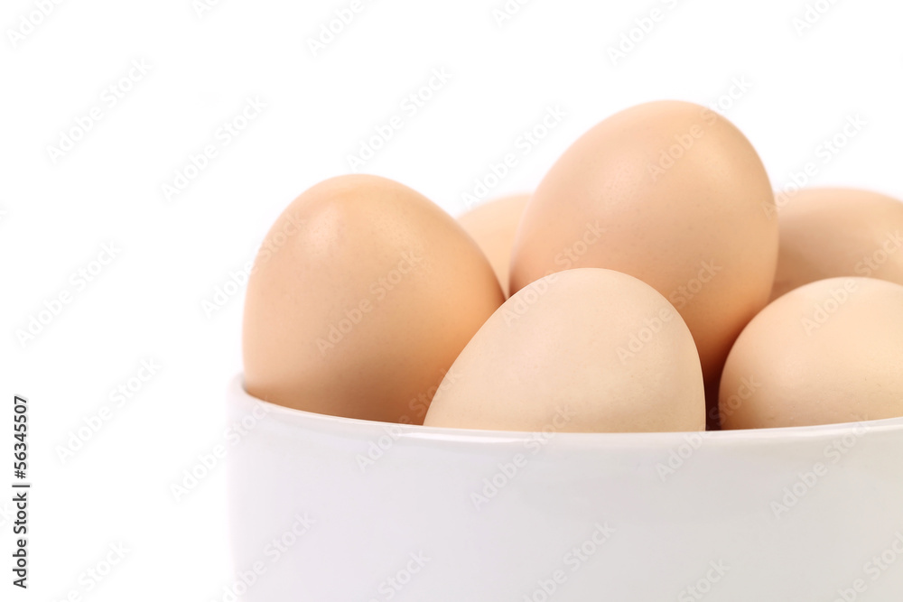 Bowl with brown eggs. Fragment. Bowl with brown eggs. Fragment.