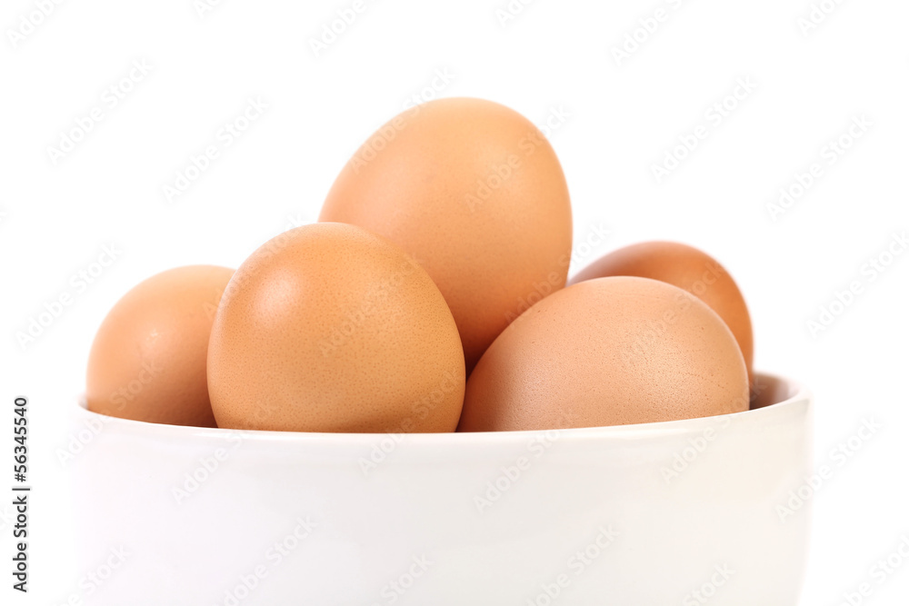 Bowl with brown eggs. Fragment. Bowl with brown eggs. Fragment.