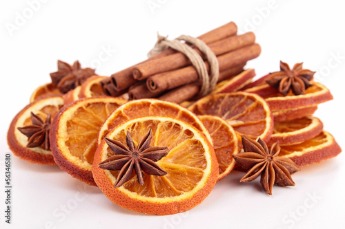 isolated dried orange slices and cinnamon