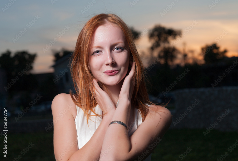 Young sexy girl on street at night