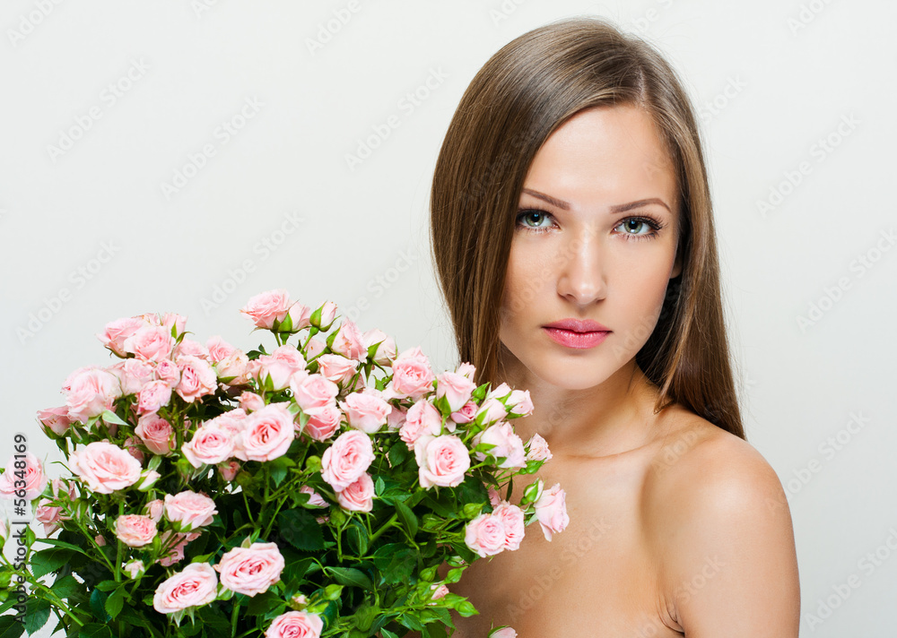 Beauty Woman with Long Healthy and Shiny Smooth Brown Hair. isol