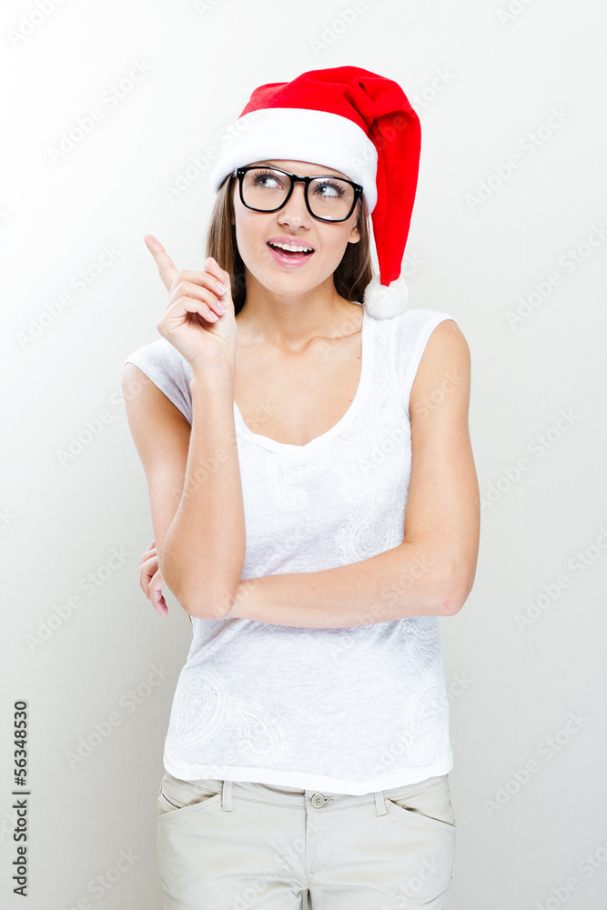 Christmas Santa hat woman portrait . Smiling happy girl . woman Christmas Santa hat woman portrait . Smiling happy girl . woman