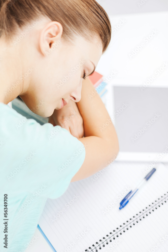 tired student sleeping on stock of books tired student sleeping on stock of books