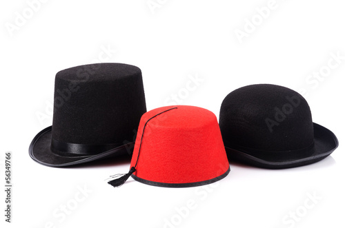 Various hats isolated on the white photo