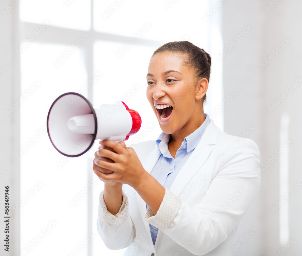 strict businesswoman shouting in megaphone strict businesswoman shouting in megaphone