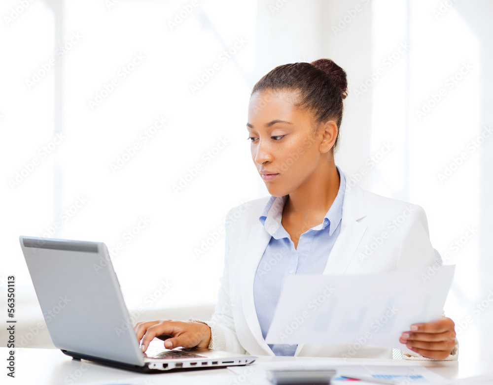businesswoman working with computer in office businesswoman working with computer in office