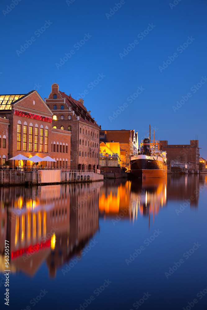Old town with Motlawa river at night in Gdansk, Poland.