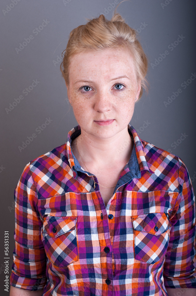 Studio portrait of freckled blonde Studio portrait of freckled blonde