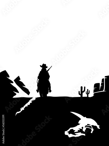 Black and white cowboy on a horse in the desert.