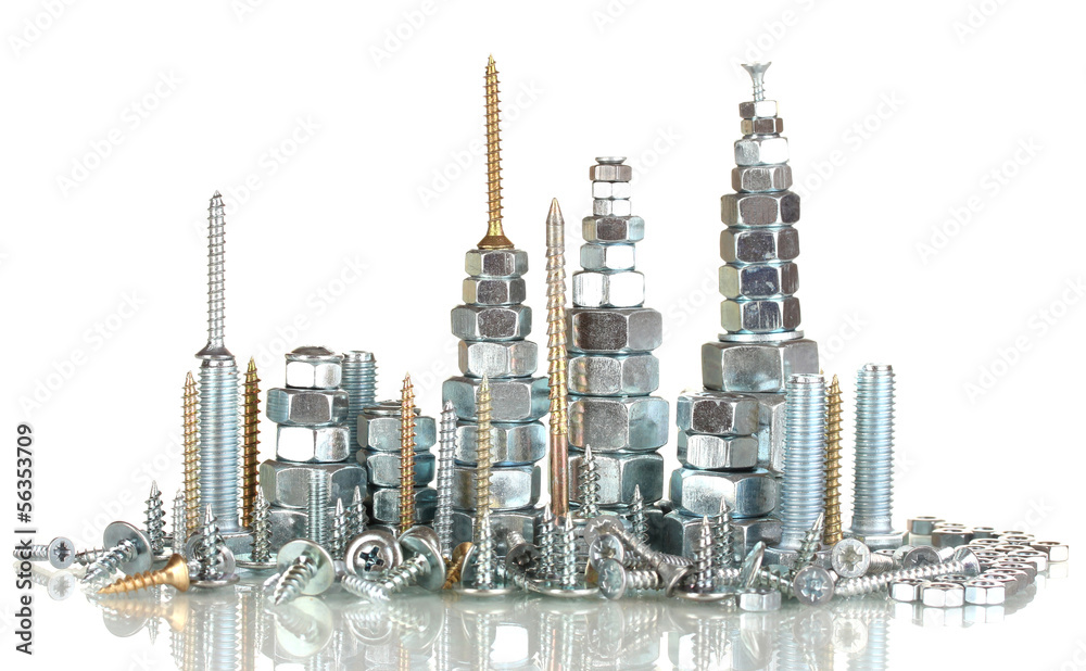 Many types of metal bolts, screws and nuts isolated on white Stock
