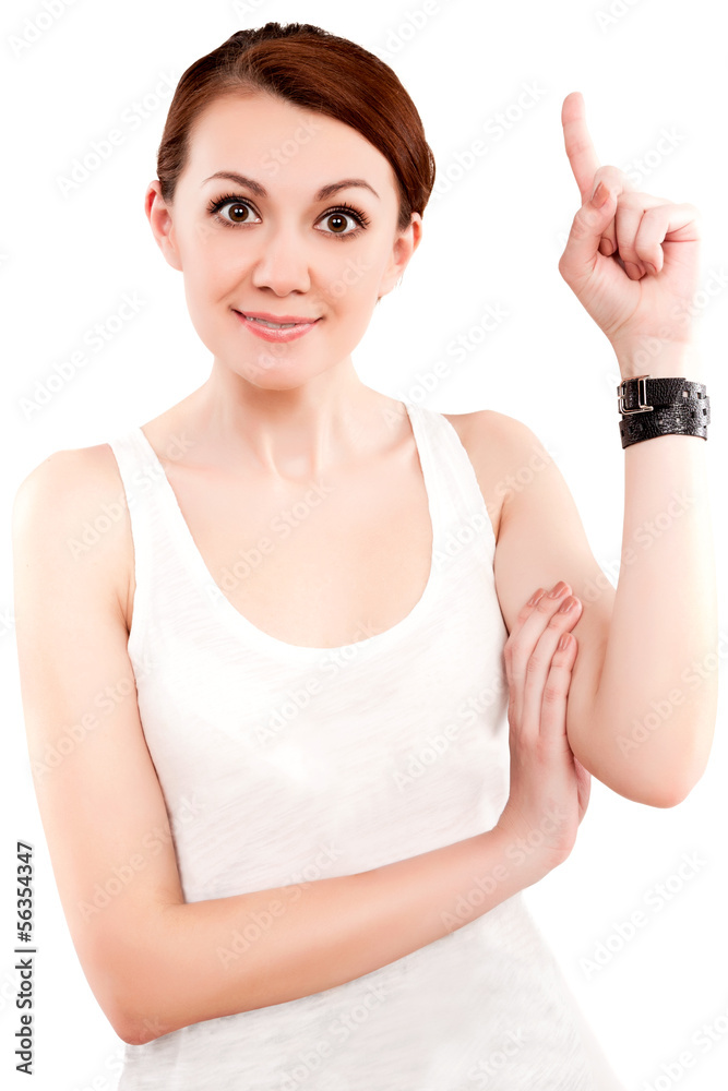 beautiful and funny brunette woman pointing up at copy space beautiful and funny brunette woman pointing up at copy space