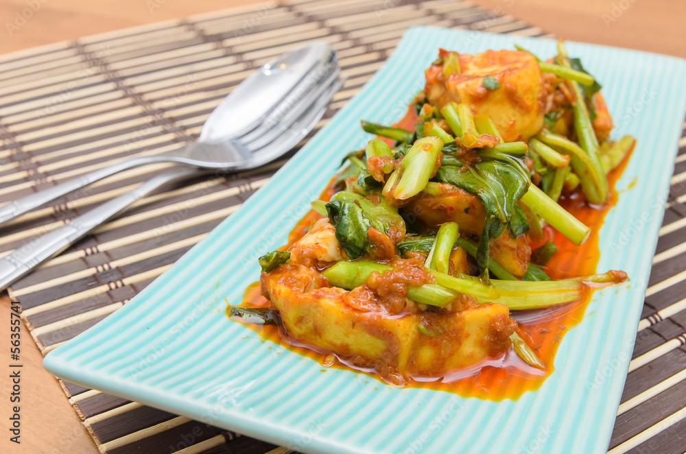 Fried Tofu with chinese kale in red curry saurce Fried Tofu with chinese kale in red curry saurce