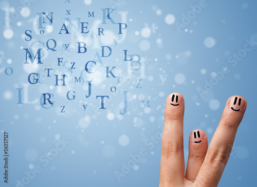 Wallpaper Mural Happy smiley fingers looking at mixture of bokeh letters Torontodigital.ca