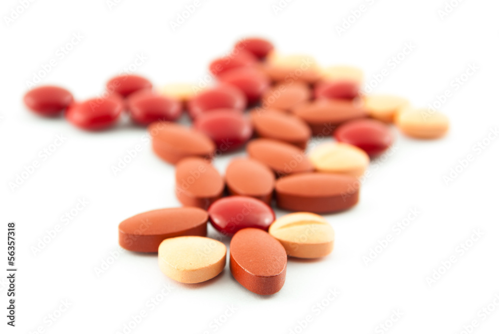 An assortment of pills, tablets isolated on white background An assortment of pills, tablets isolated on white background