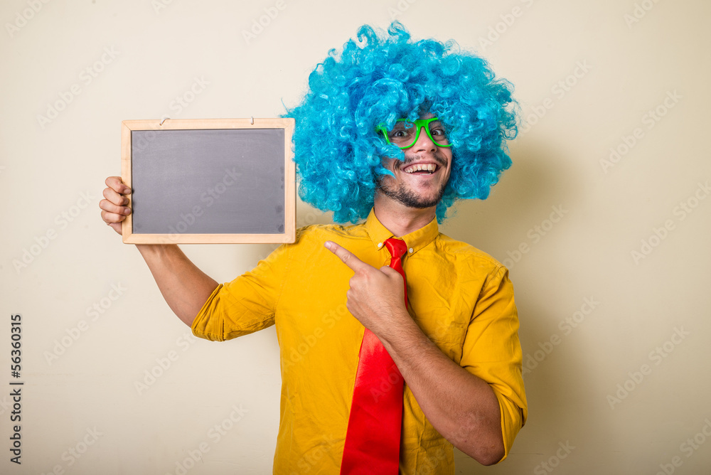 © Eugenio Marongiu - crazy funny young man with blue wig © Eugenio Marongiu - crazy funny young man with blue wig