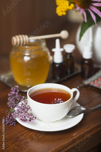 Still life from medicinal herbs, honey, herbal tea and medicines