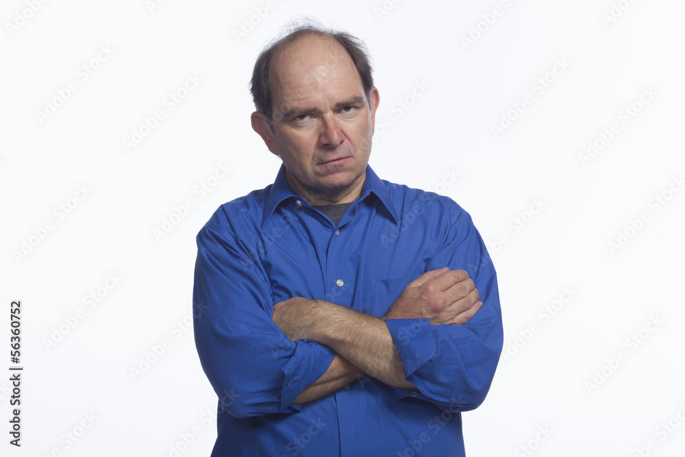 Upset man with arms crossed, horizontal Upset man with arms crossed, horizontal