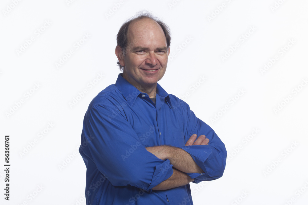 Smiling man with arms crossed, horizontal Smiling man with arms crossed, horizontal
