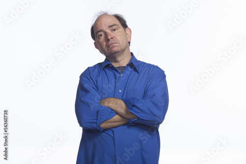 Annoyed man with arms crossed, horizontal