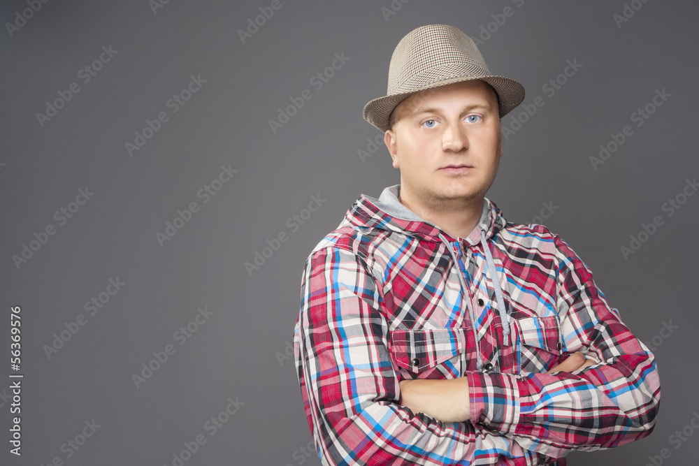 Fototapeta premium Portrait of Young Man in hat