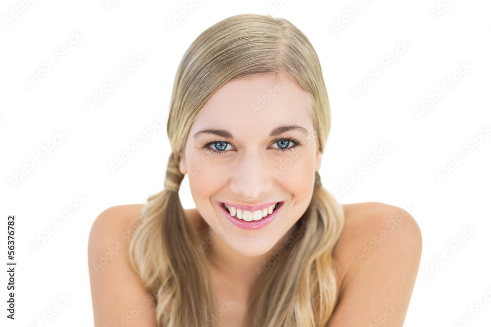 Charming young blonde woman looking at camera Charming young blonde woman looking at camera