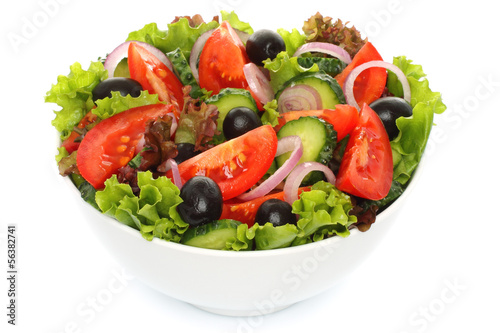 Salad of fresh vegetables on white background.