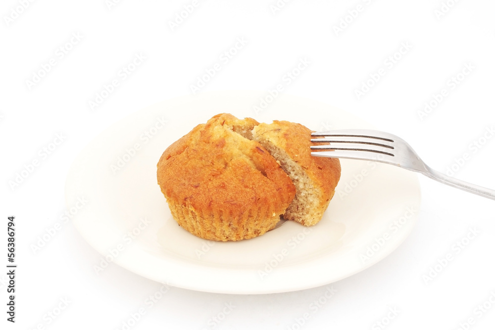 Banana cup cake on plate with fork Banana cup cake on plate with fork