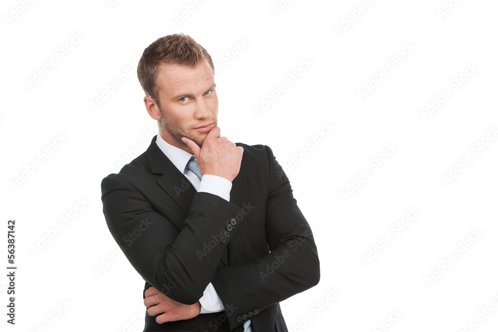 Confident businessman. Portrait of cheerful young businessman lo Confident businessman. Portrait of cheerful young businessman lo