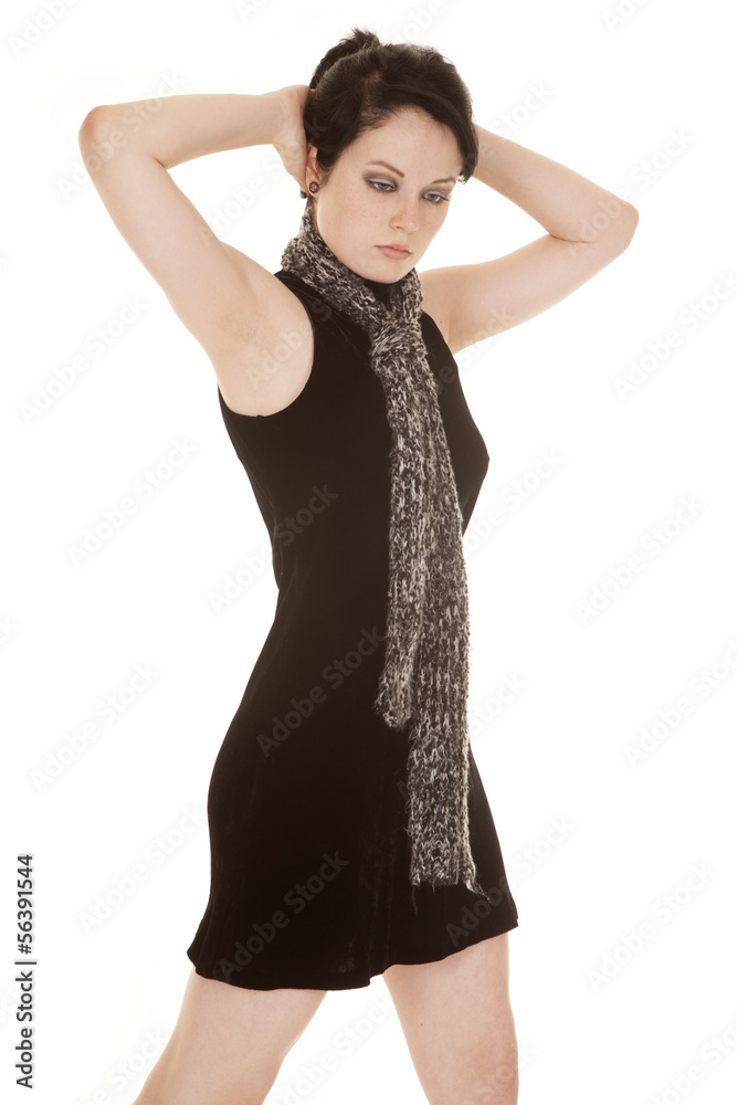 woman black dress scarf hands back of head woman black dress scarf hands back of head