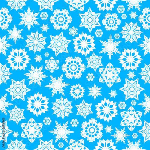 seamless pattern with white snowflakes on a blue background.wint
