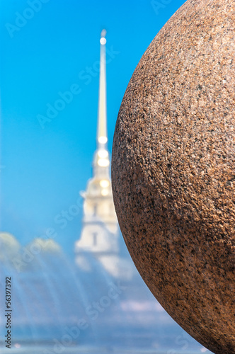 Stone ball on the background of the spire