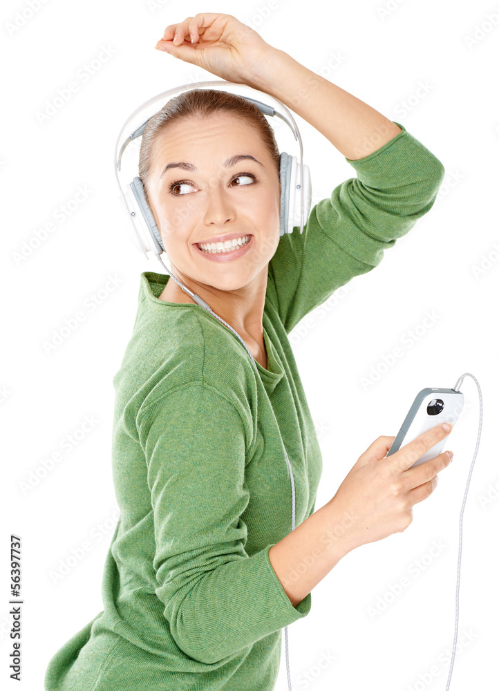 Happy woman dancing to her music Happy woman dancing to her music
