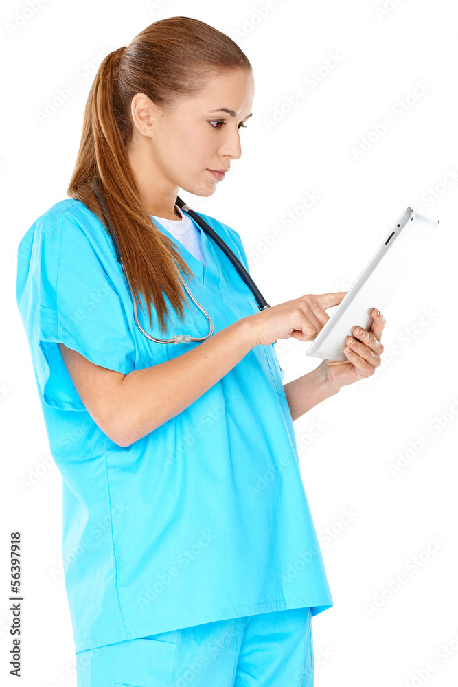 Doctor checking information on a tablet Doctor checking information on a tablet