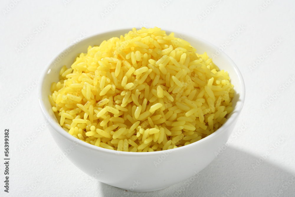 Cooked yellow rice in a bowl Cooked yellow rice in a bowl