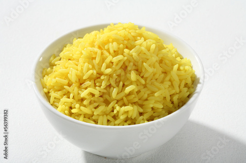 Cooked yellow rice in a bowl