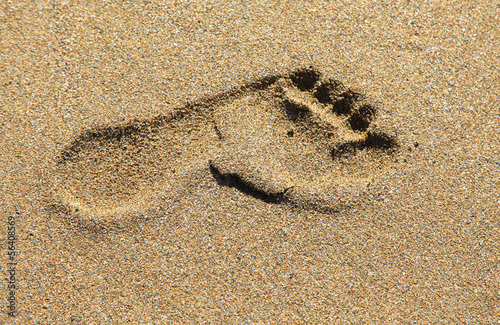 Footprints in the sand photo