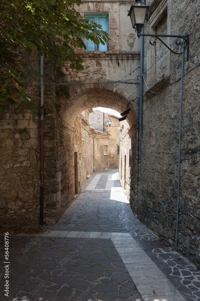 Street with arch in an Italian village