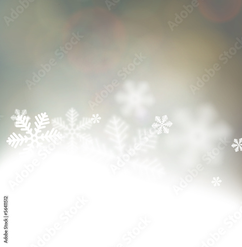Christmas background with defocused snowflakes. © Vjom