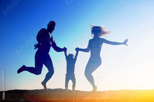 Fototapeta Naklejka Na Ścianę i Meble -  Silhouette of happy family