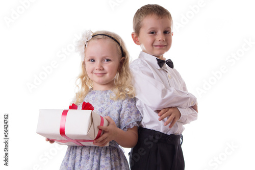 Smiling boy and girl with present box