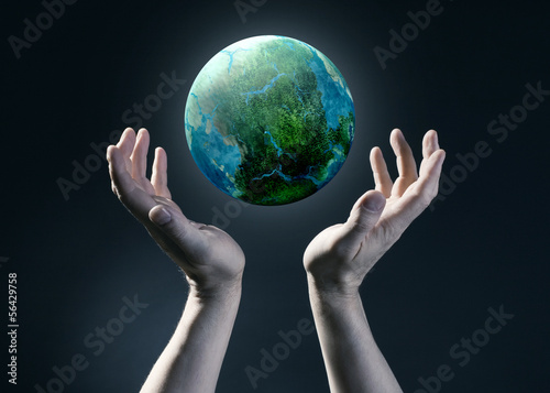 hands holding earth
