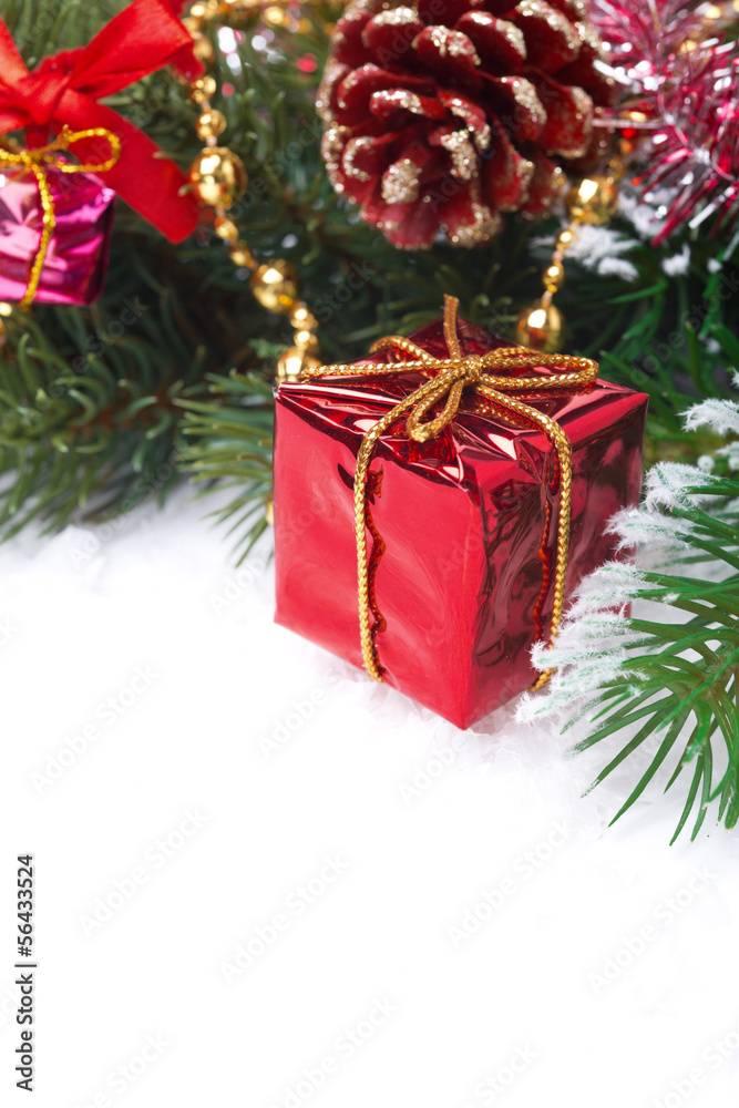 Christmas composition with decorations and red gift box