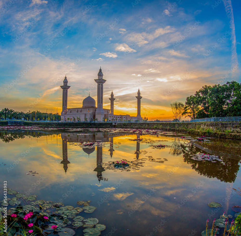 Mosque and reflection at sunrise